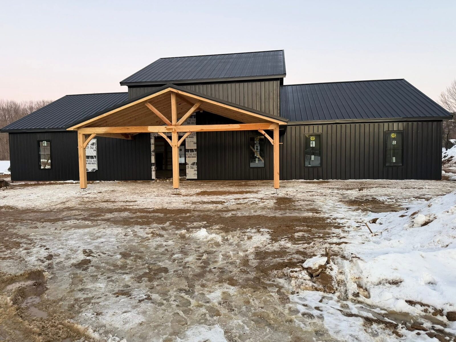 Custom barndominium build with timber-frame entry — Berrien County, SW Michigan